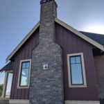 Burgundy House With Grey Chimney