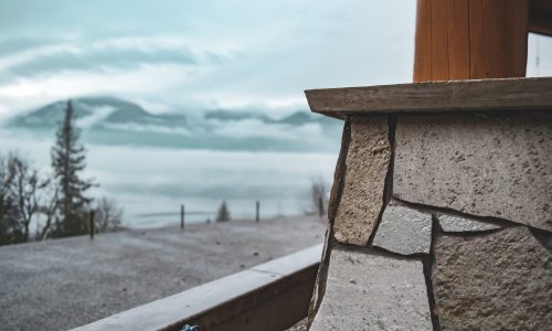 stone pillar with mountain views