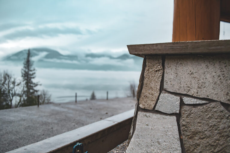 stone pillar with mountain views